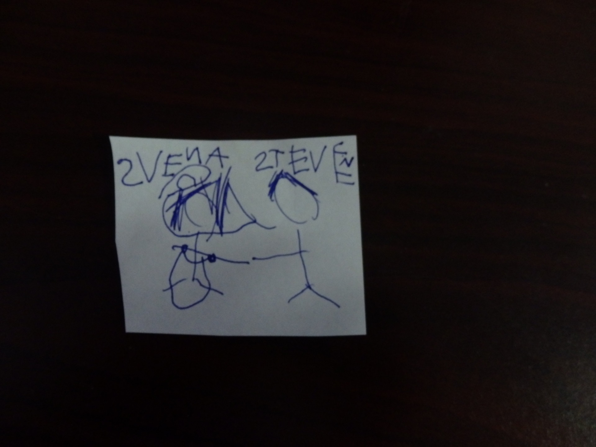 child's drawing of a bride and groom with their names spelled wrong
