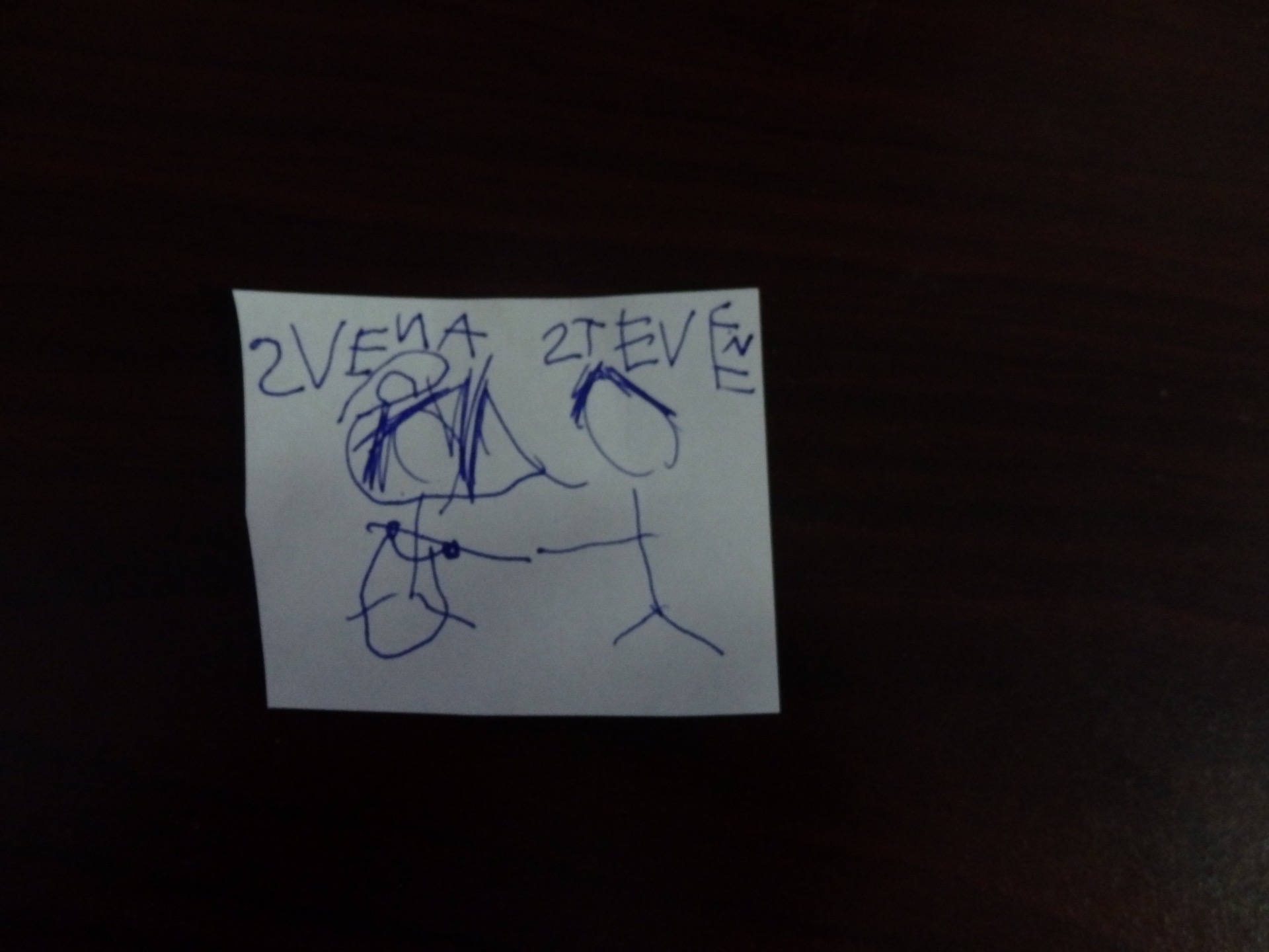 child's drawing of a bride and groom with their names spelled wrong