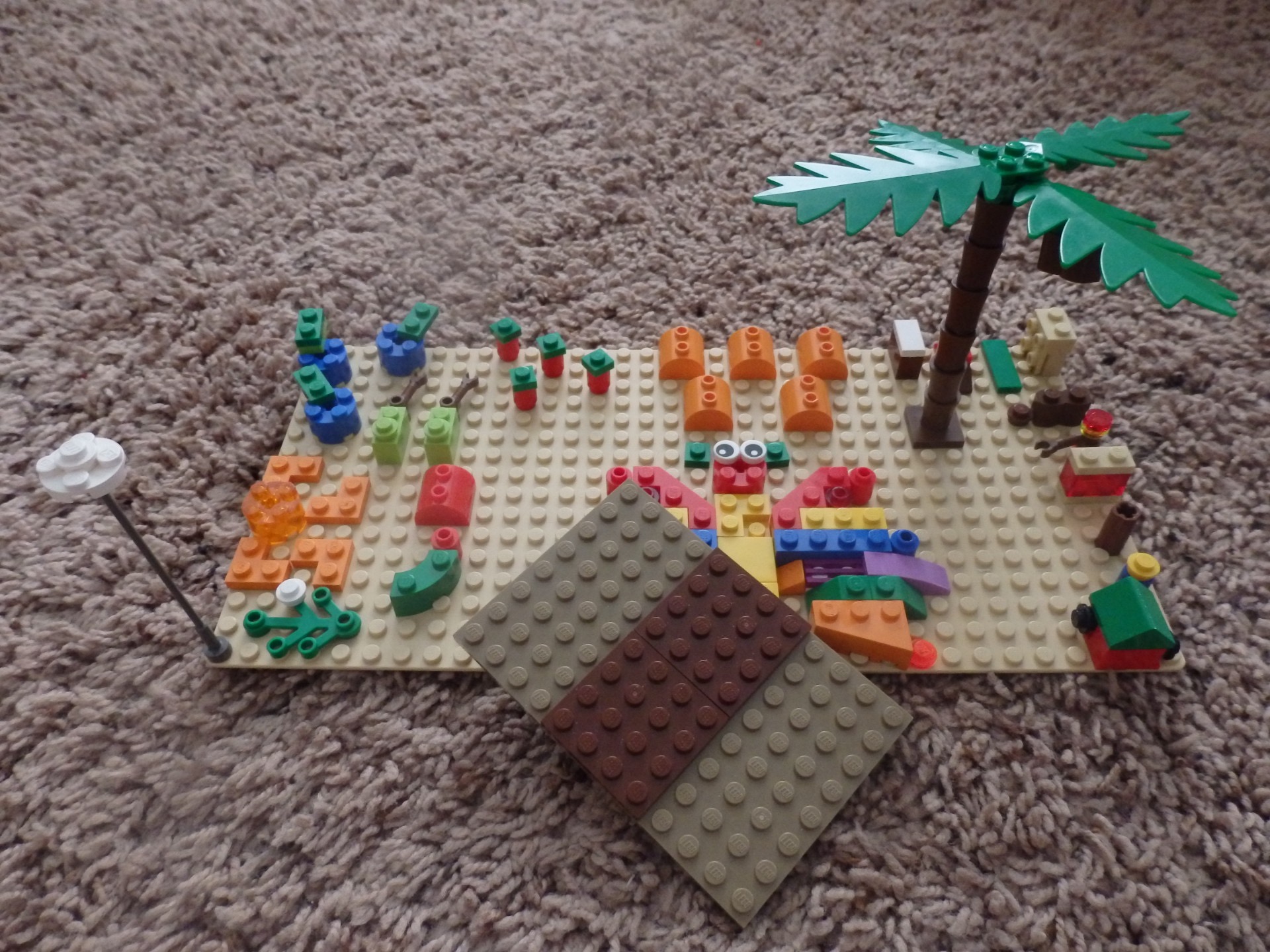 lego pieces forming the story of the Very Hungry Caterpillar