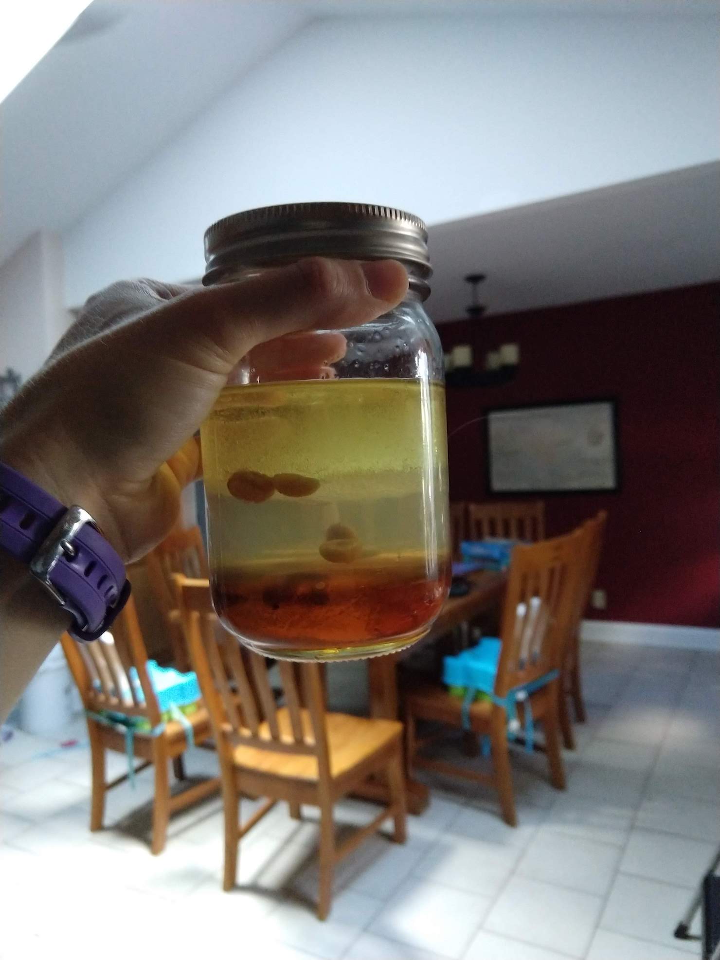 jar with honey, oil, and water