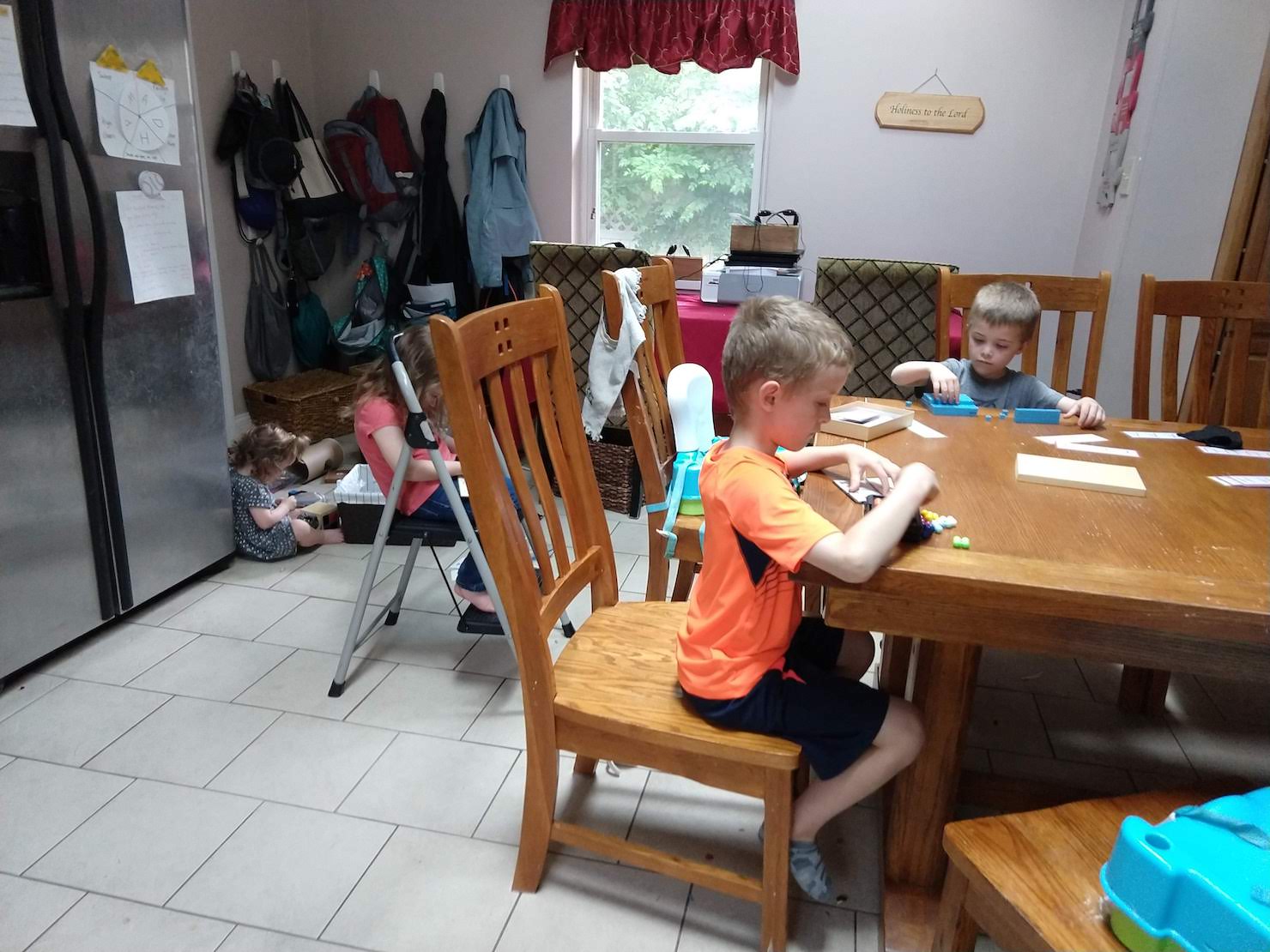 Table Game Tuesday. Children playing with toys that teach concepts